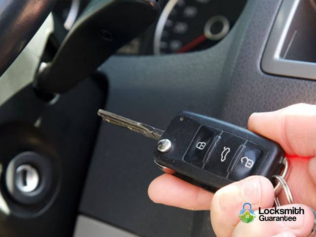 Transponder key held beside the ignition barrel it has been coded to