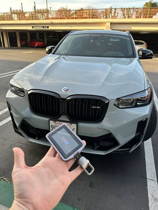 BMW smart key fob on a programmer, part-way through pairing