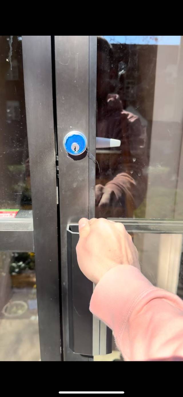 Mortise lock going into the narrow stile of a storefront door