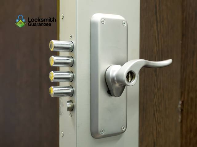 Multi-point lock throwing bolts along the full height of a door edge