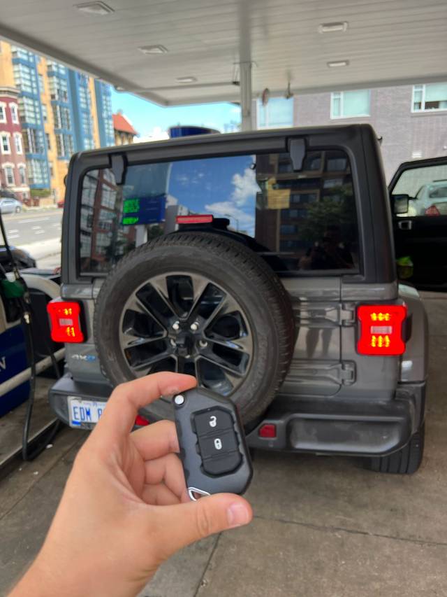 Jeep Wrangler key fob being coded to the vehicle