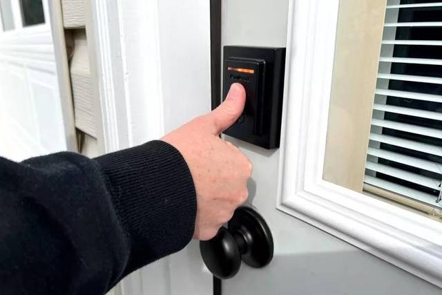 Kwikset keypad lock fitted and tested on a house door