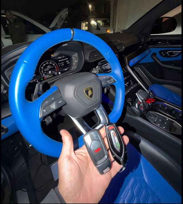 Lamborghini key fob being programmed