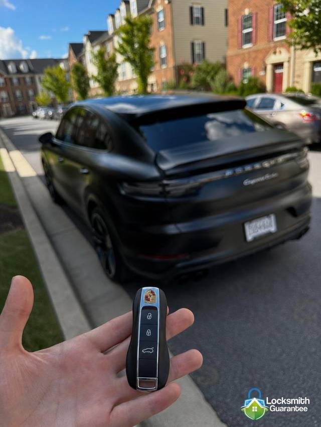 Porsche Cayenne key fob being programmed