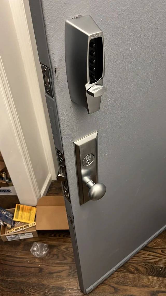 Simplex push-button lock fitted to a second door in the same building